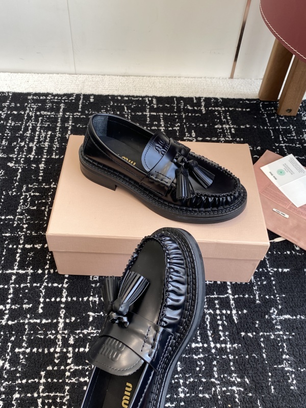 Miu Miu Tassel-embellished Loafers