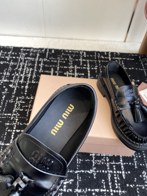 Miu Miu Tassel-embellished Loafers
