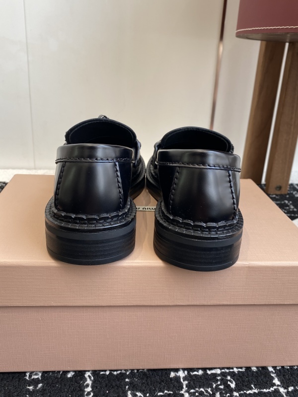 Miu Miu Tassel-embellished Loafers